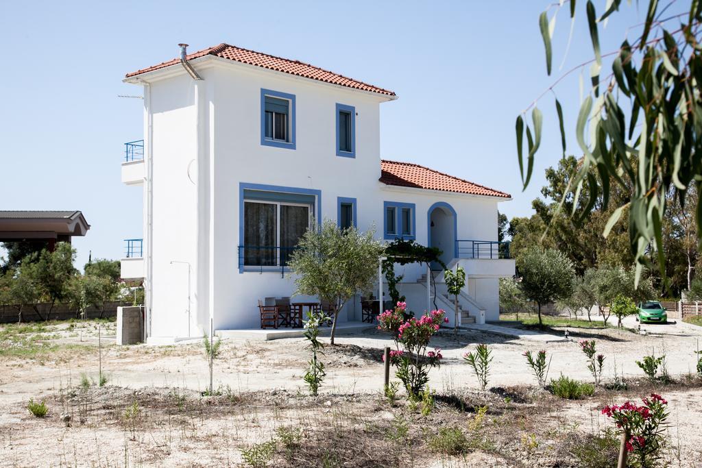 Romanos XI Xi Beach Bagian luar foto